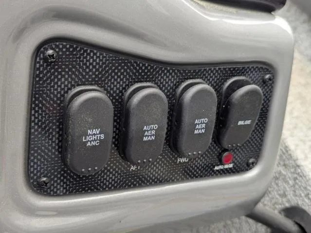 Slide: The Image of Control panel of 2022 G3 Sportsman 1710 boat with labeled switches. - 39