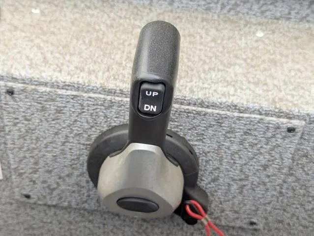 Slide: The Image of Throttle control lever on 2022 G3 Sportsman 1710 boat, featuring "UP" and "DN" buttons. - 40