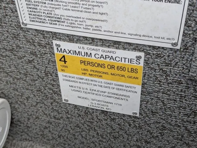 Slide: The Image of U.S. Coast Guard capacity label on 2022 G3 Sportsman 1710 boat, maximum 4 persons or 650 lbs. - 41