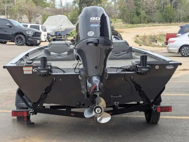 Slide: The Image of 2022 G3 Sportsman 1710 boat with 90 HP engine, parked in a lot. - 5