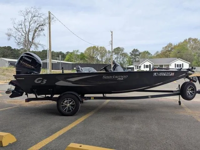 Slide: The Image of 2022 G3 Sportsman 1710 boat on trailer, parked outdoors. - 7