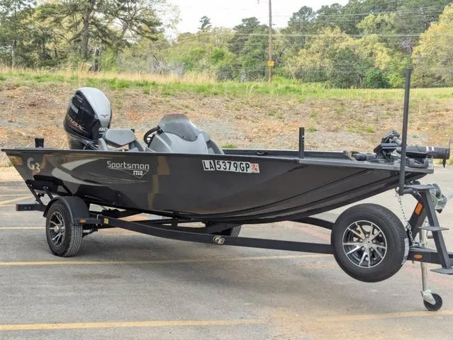 Slide: The Image of 2022 G3 Sportsman 1710 boat on trailer, parked outdoors. - 8