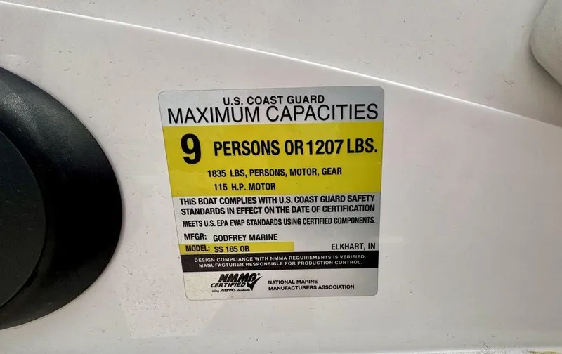 Slide: The Image of U.S. Coast Guard capacity label on 2022 Hurricane SunDeck Sport 185 OB boat. - 5
