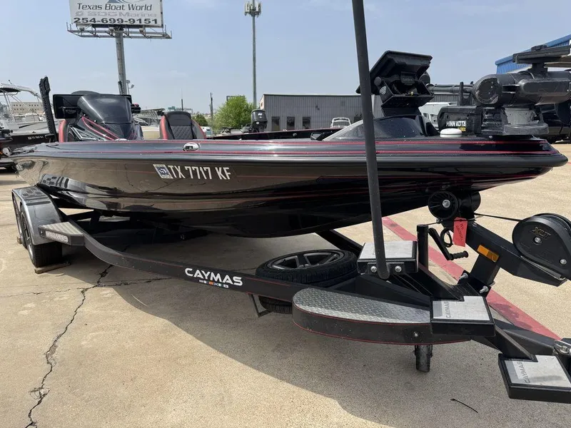 Slide: The Image of 2021 Caymas CX 20 boat on trailer at Texas Boat World dealership. - 3