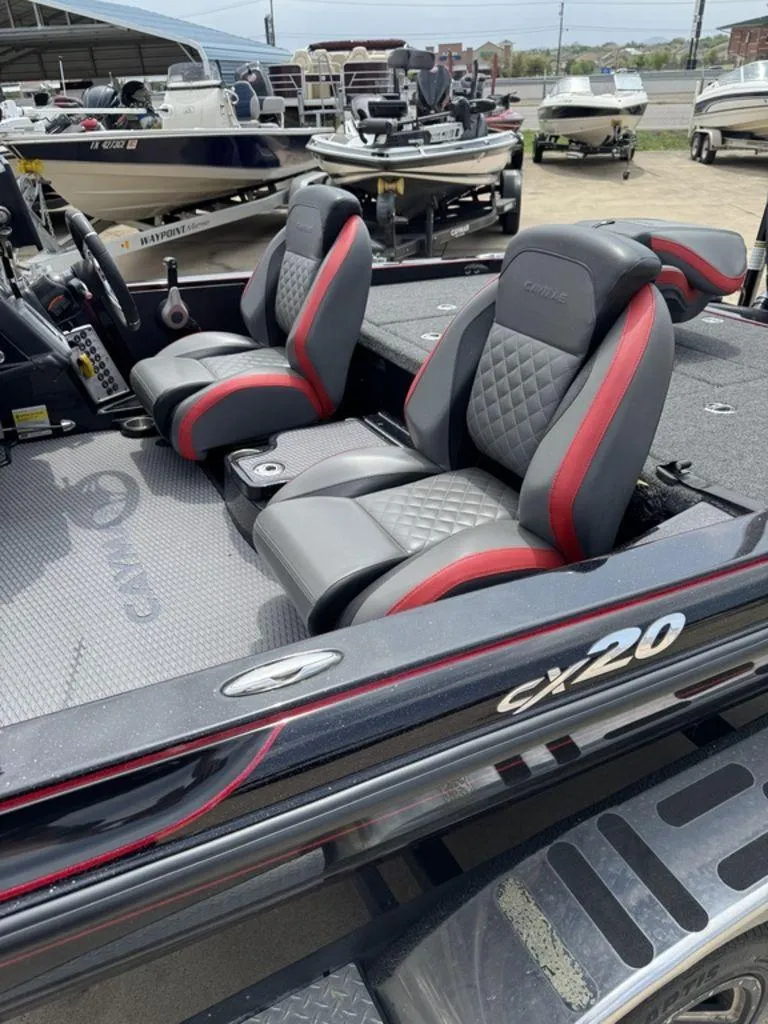 Slide: The Image of 2021 Caymas CX 20 boat interior with stylish seats and modern design. - 9