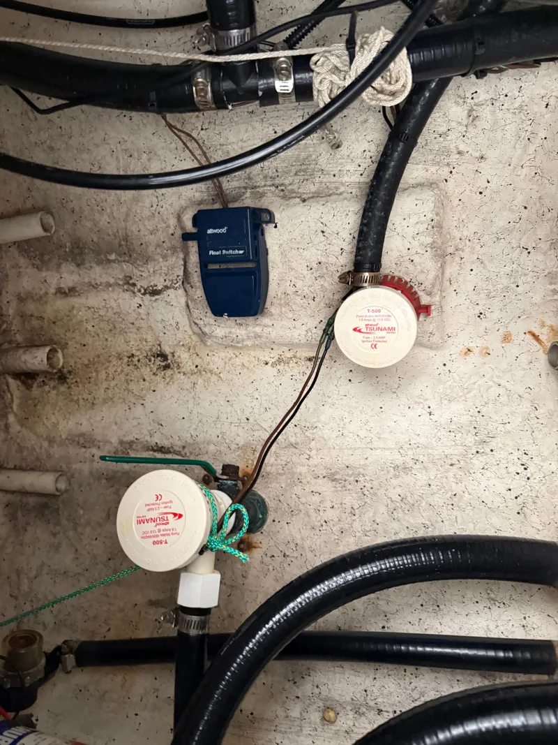 Slide: The Image of Bilge area of a 2014 Bulls Bay 1700 boat with wiring and components. - 13