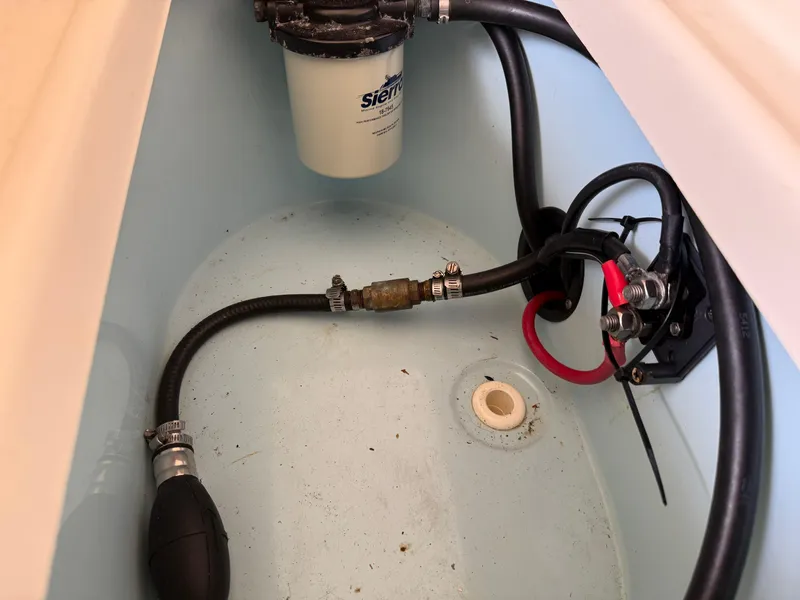 Slide: The Image of 2014 Bulls Bay 1700 boat interior with fuel filter and hoses. - 16