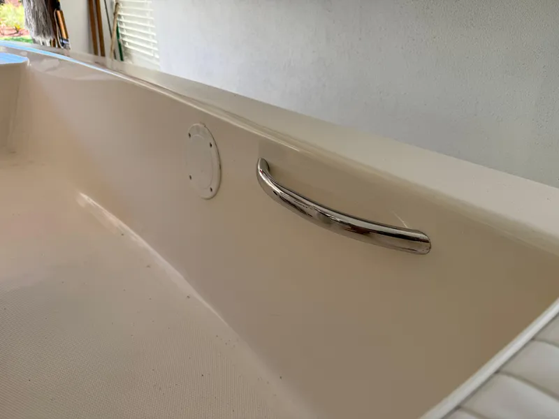 Slide: The Image of 2014 Bulls Bay 1700 boat interior with stainless steel handle detail. - 25