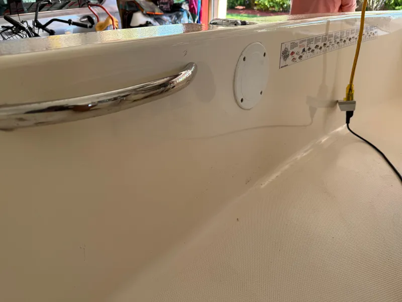 Slide: The Image of 2014 Bulls Bay 1700 boat interior with handle and wiring detail. - 26