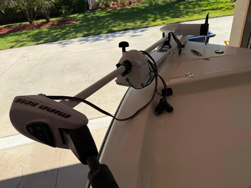 Slide: The Image of 2014 Bulls Bay 1700 boat with a Minn Kota trolling motor in a driveway. - 32