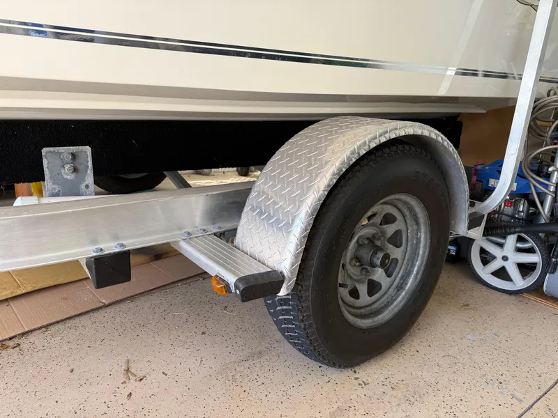Slide: The Image of 2014 Bulls Bay 1700 boat trailer with diamond plate fender and wheel. - 6
