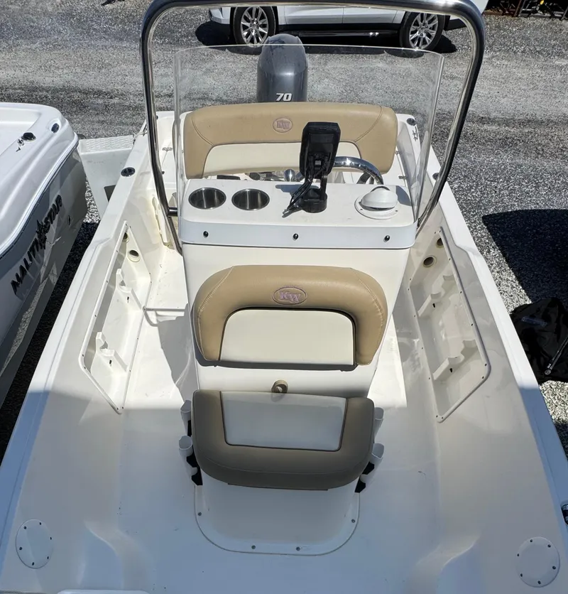 Slide: The Image of 2018 Key West 1720 Center Console boat interior with steering wheel and seating. - 6