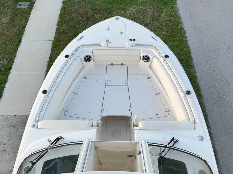 Slide: The Image of 2019 Grady-White Freedom 325 boat interior with helm, seating, and navigation equipment. - 20