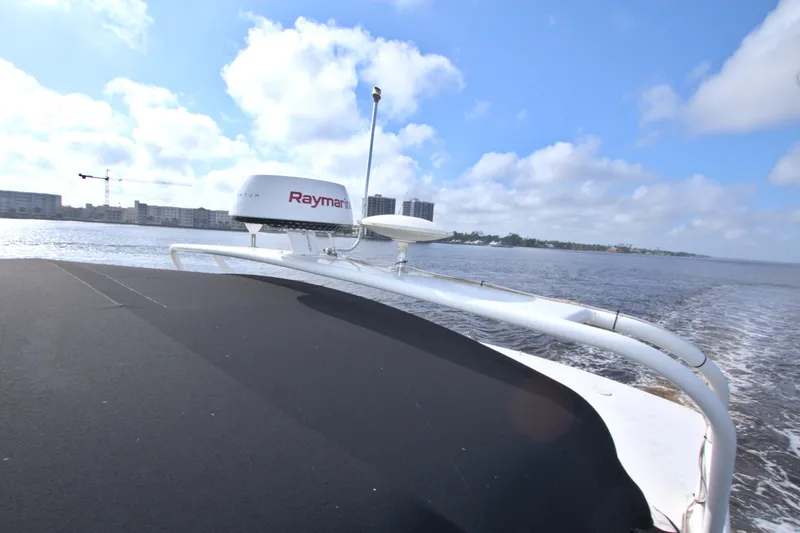 Slide: The Image of 2006 Silverton 39 Motor Yacht cruising on a sunny day with clear skies. - 34