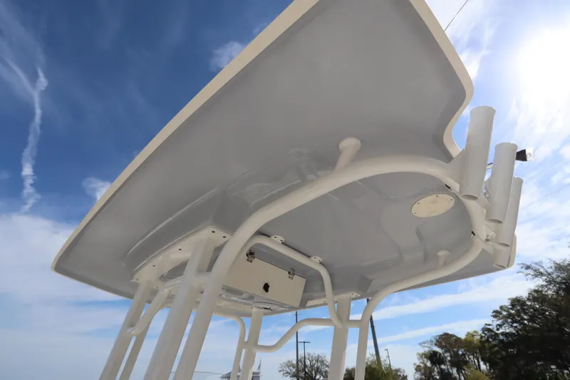 Slide: The Image of 2021 Robalo R242 Explorer boat's T-top against a clear blue sky. - 10