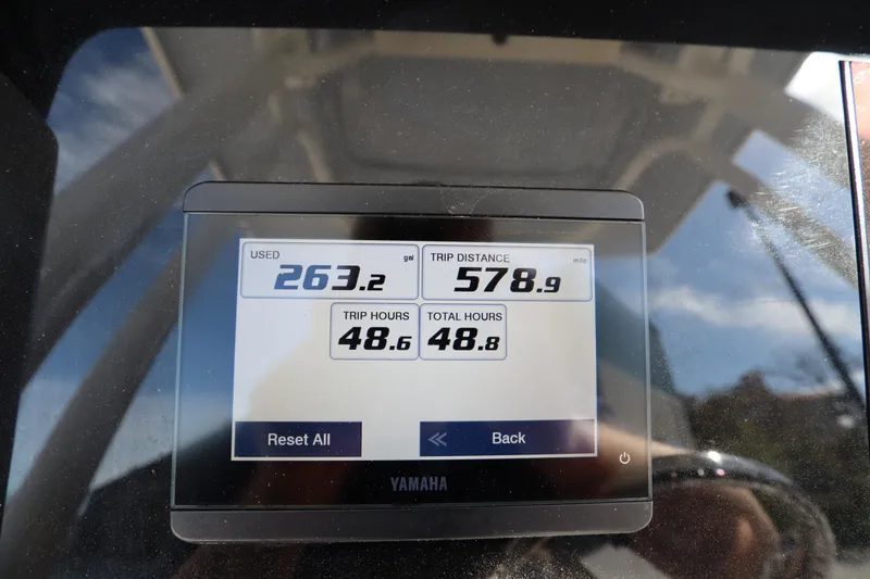 Slide: The Image of Yamaha display showing trip data on a 2021 Robalo R242 Explorer boat. - 27