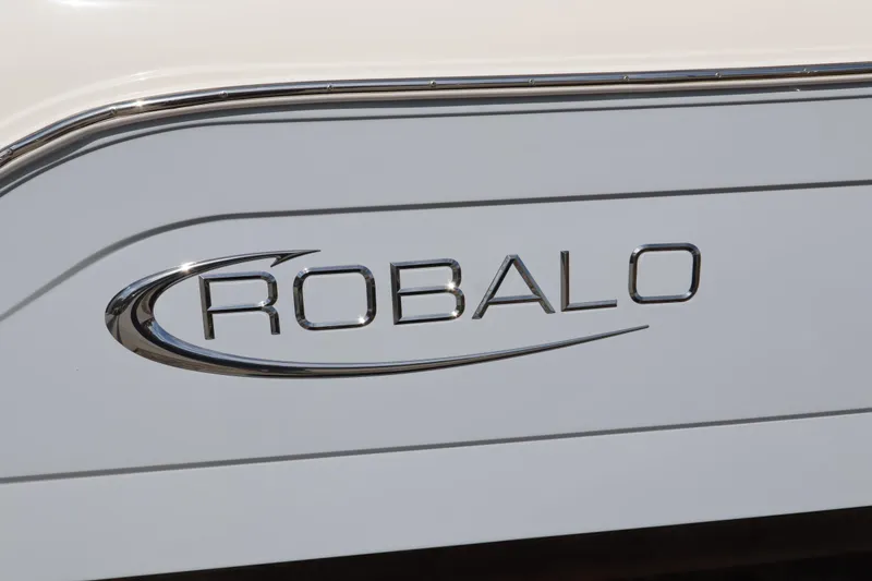 Slide: The Image of Robalo R242 Explorer 2021 logo on boat exterior, sleek and modern design. - 6