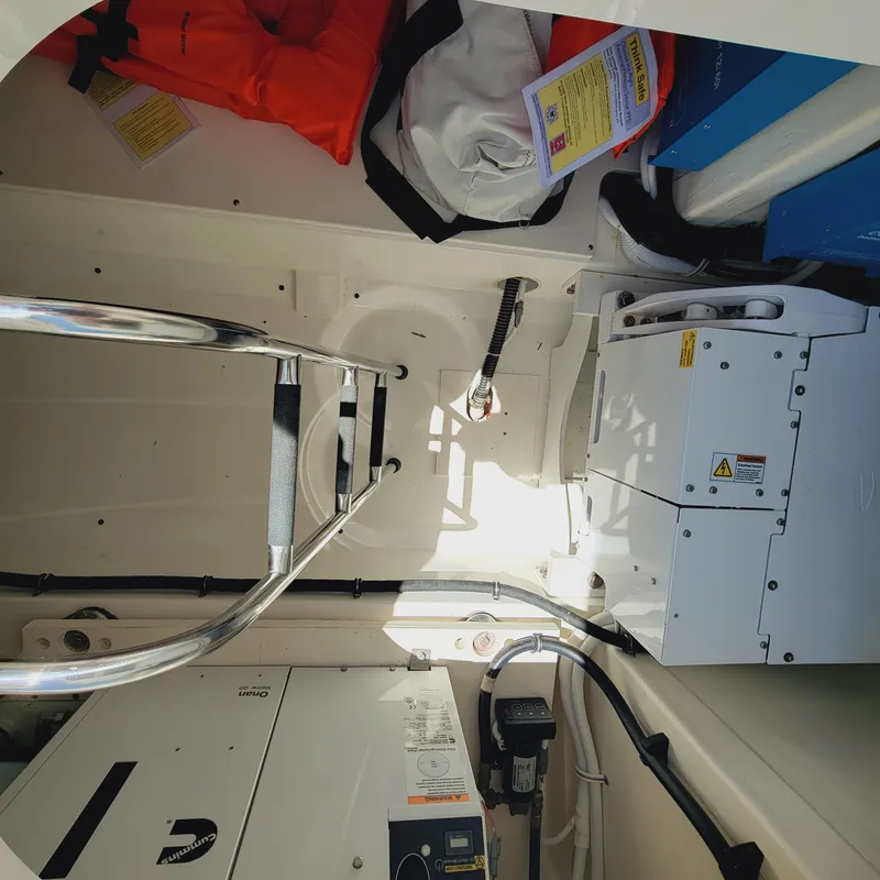Slide: The Image of Interior view of 2021 Tiara Yachts 38 LS engine compartment with safety equipment. - 45