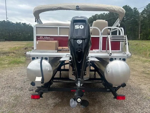 Slide: The Image of 2025 Sun Tracker Bass Buggy 16 XL Select pontoon boat with Mercury 50 outboard motor. - 6