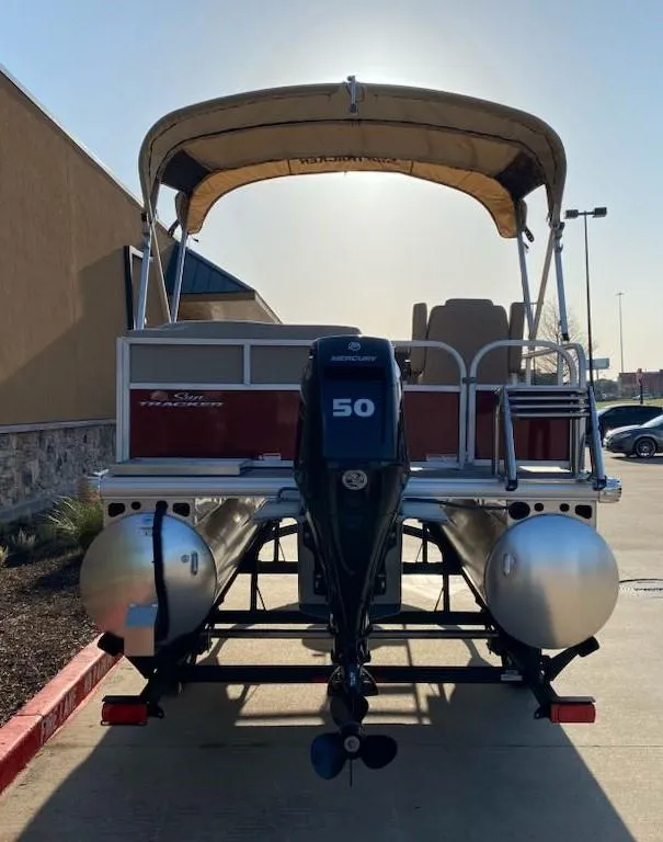 Slide: The Image of 2025 Sun Tracker Bass Buggy 16 XL Select pontoon boat with canopy and 50 HP motor. - 7