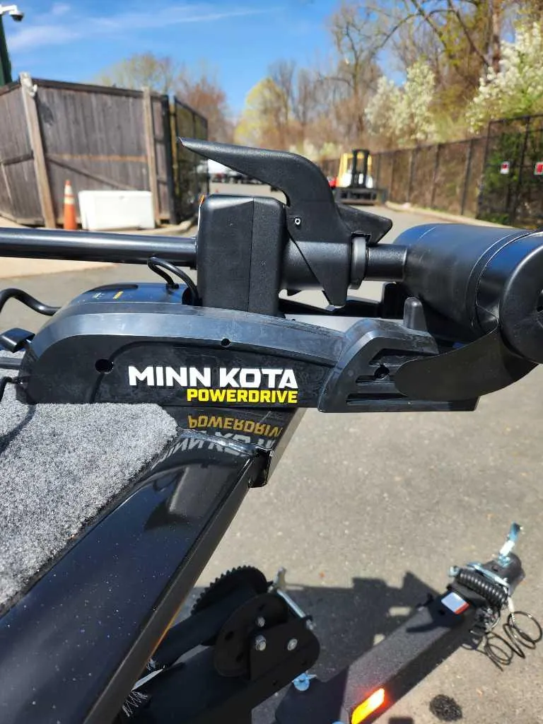 Slide: The Image of Minn Kota PowerDrive on 2025 Tracker Pro Guide V-16 WT boat, outdoor setting. - 4