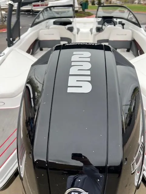 Slide: The Image of 2024 Tahoe 210 S boat with powerful engine, sleek design, and modern interior. - 12