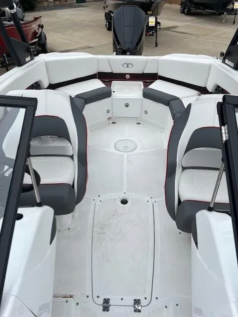 Slide: The Image of 2024 Tahoe 210 S boat interior with spacious seating and modern design. - 8