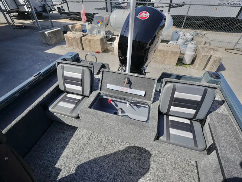 Slide: The Image of 2025 Ranger VS1782SC Reata boat interior with seating and storage compartments. - 14