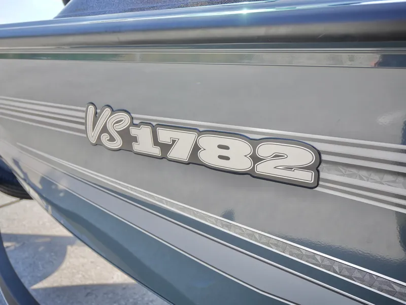 Slide: The Image of 2025 Ranger VS1782SC Reata boat model detail with sleek design and branding. - 16