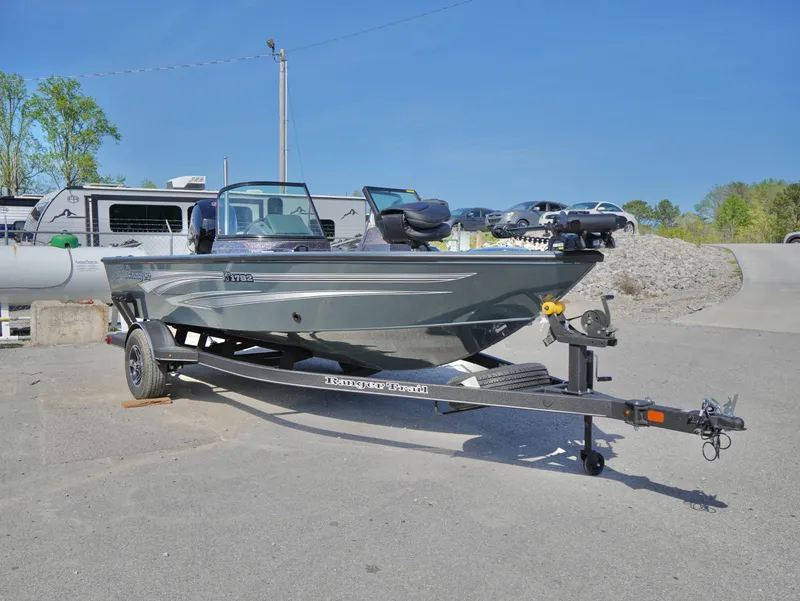 Slide: The Image of 2025 Ranger VS1782SC Reata boat on trailer in outdoor setting. - 17