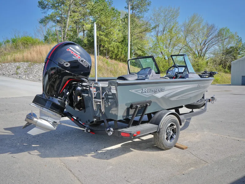 Slide: The Image of 2025 Ranger VS1782SC Reata boat with powerful outboard motor, parked outdoors. - 3