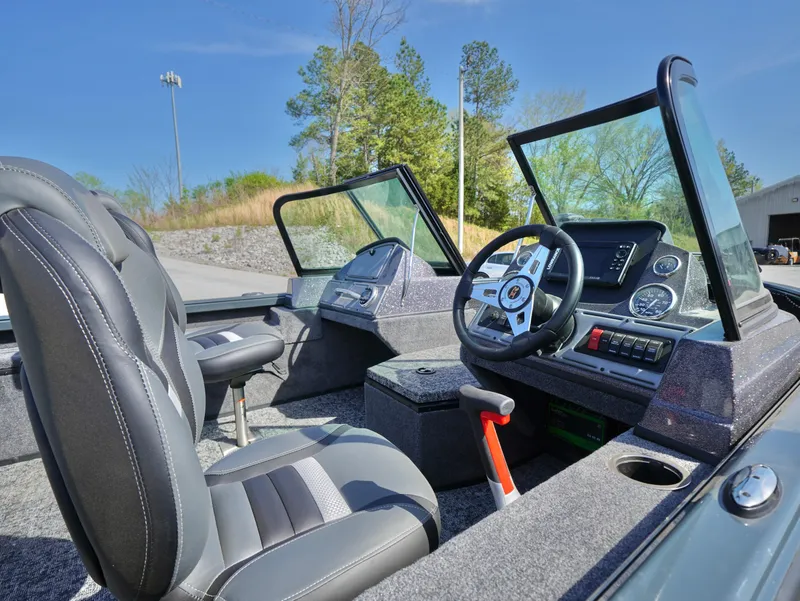 Slide: The Image of 2025 Ranger VS1782SC Reata boat interior with modern dashboard and seating. - 6