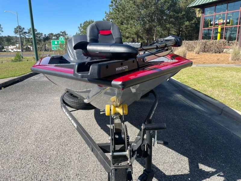 Slide: The Image of 2025 Tracker Pro Team 175 boat on trailer, parked outdoors, sunny day. - 3