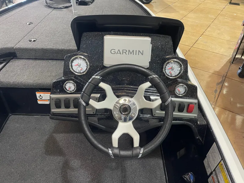 Slide: The Image of Steering console of 2025 Nitro Z18 Pro boat with Garmin display and gauges. - 10
