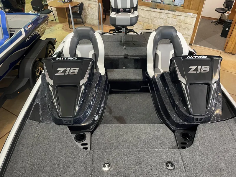 Slide: The Image of 2025 Nitro Z18 Pro boat interior with dual seats and sleek design. - 12