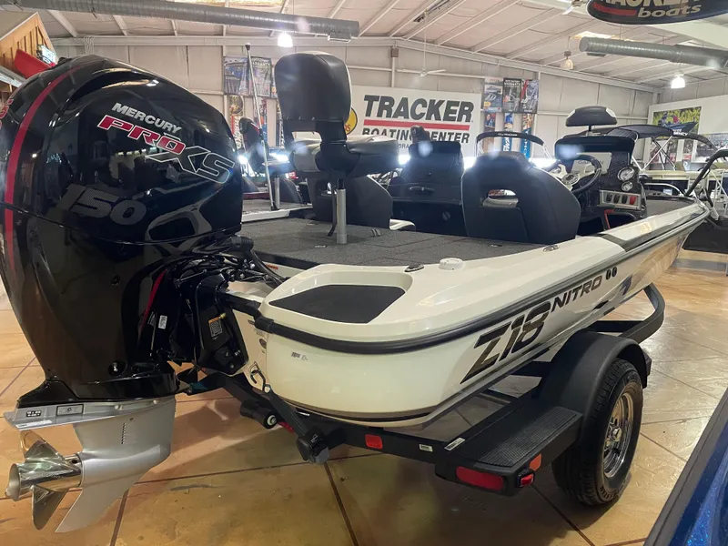 Slide: The Image of 2025 Nitro Z18 Pro boat with Mercury engine displayed in showroom. - 4