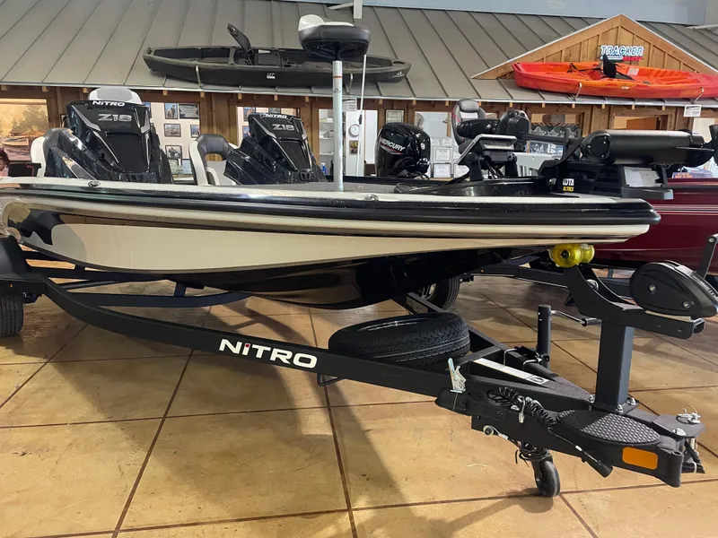 Slide: The Image of 2025 Nitro Z18 Pro fishing boat on display in showroom. - 6