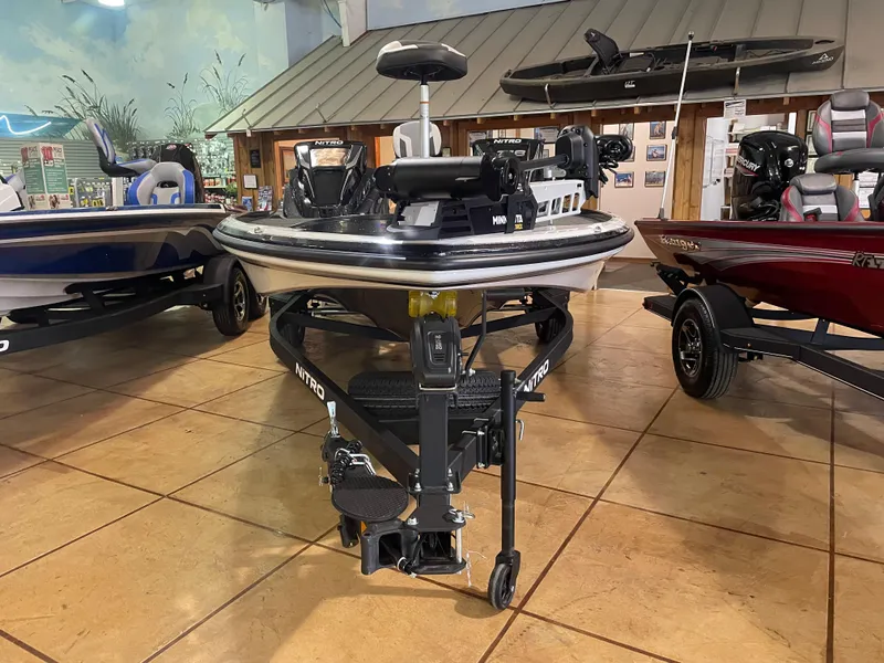 Slide: The Image of 2025 Nitro Z18 Pro fishing boat displayed indoors, showcasing advanced features and sleek design. - 7