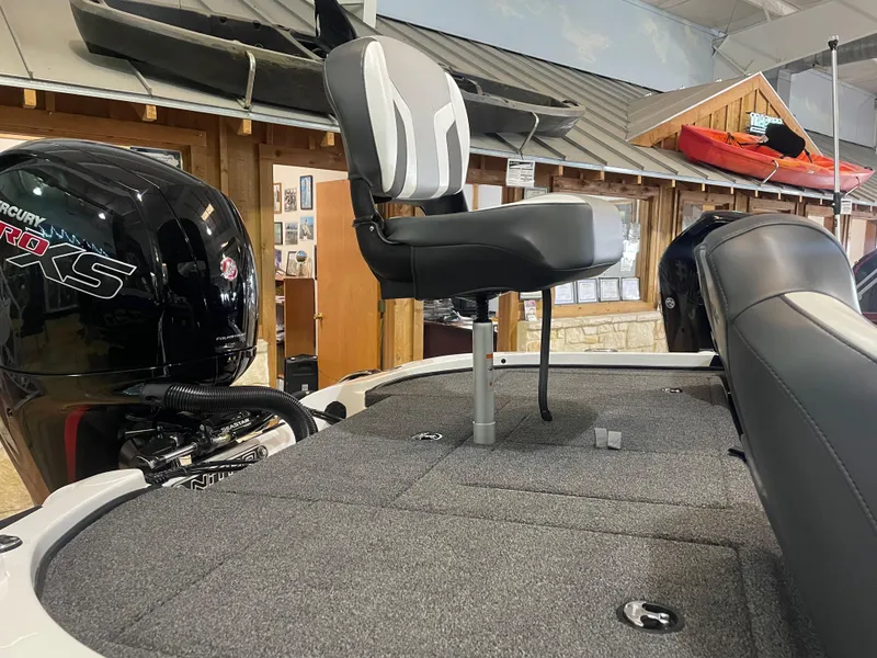 Slide: The Image of 2025 Nitro Z18 Pro boat interior with seating and Mercury Pro XS engine. - 8