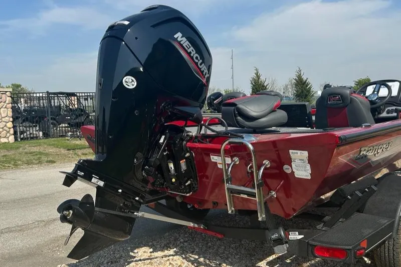 Slide: The Image of 2025 Ranger RT178 boat with Mercury outboard motor, parked on a trailer. - 5