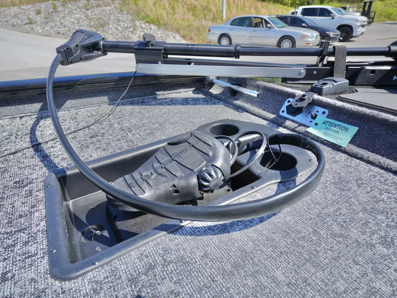 Slide: The Image of 2025 Tracker Pro Team 175 boat deck with foot pedal and control cables. - 15