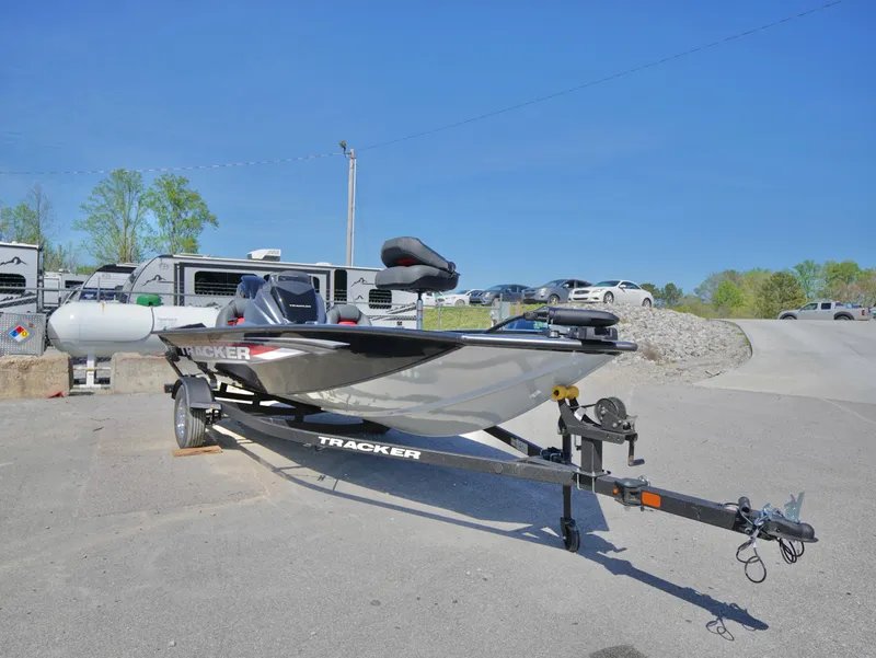 Slide: The Image of 2025 Tracker Pro Team 175 boat on trailer in outdoor setting. - 20