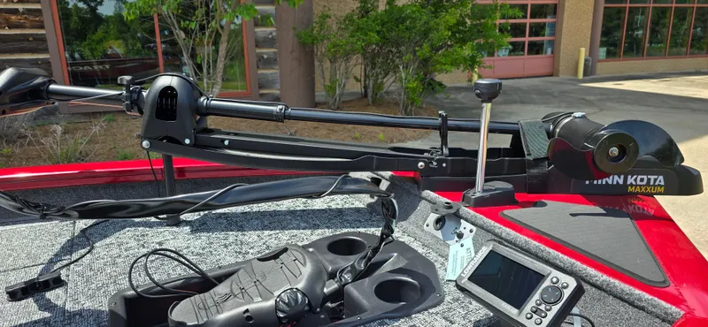 Slide: The Image of 2025 Tracker Pro Team 175 boat with Minn Kota trolling motor and control panel. - 5