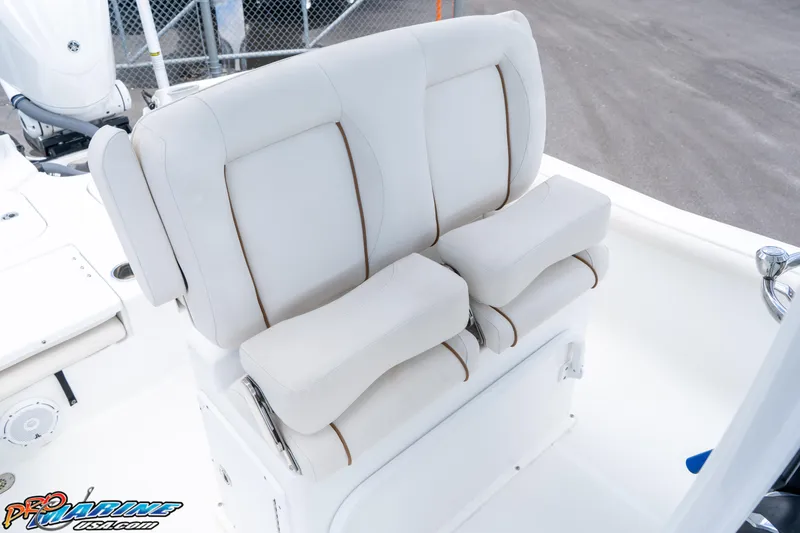 Slide: The Image of 2022 Sea Hunt BX 25 FS boat seating with white cushioned seats. - 14