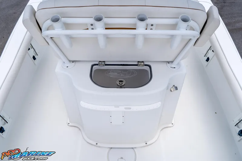 Slide: The Image of 2022 Sea Hunt BX 25 FS boat with rod holders and storage compartment. - 18