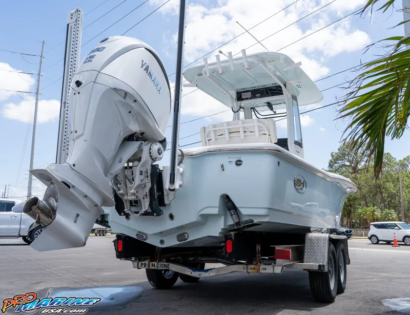 Slide: The Image of 2022 Sea Hunt BX 25 FS boat on trailer with Yamaha outboard motor. - 4