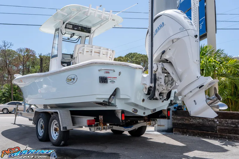 Slide: The Image of 2022 Sea Hunt BX 25 FS boat on trailer with Yamaha outboard motor. - 6