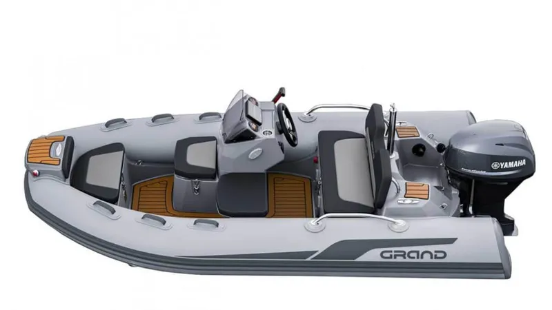 Slide: The Image of 2025 Grand G380N inflatable boat with Yamaha engine, sleek design, and modern seating. - 3