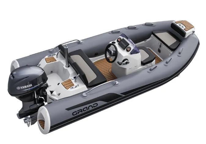 Slide: The Image of 2025 Grand G380N inflatable boat with Yamaha engine, featuring sleek design and modern seating. - 5