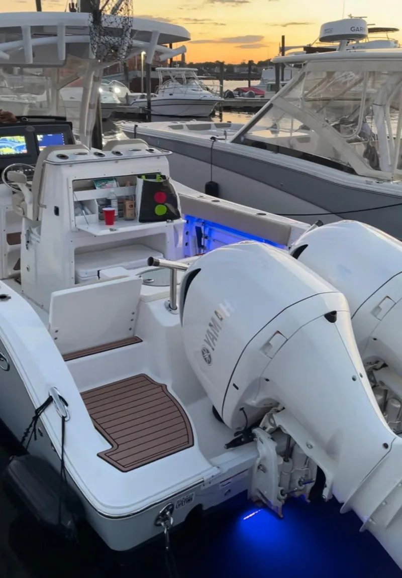 Slide: The Image of 2017 Sea Fox 288 Commander boat with dual Yamaha engines at sunset dock. - 15